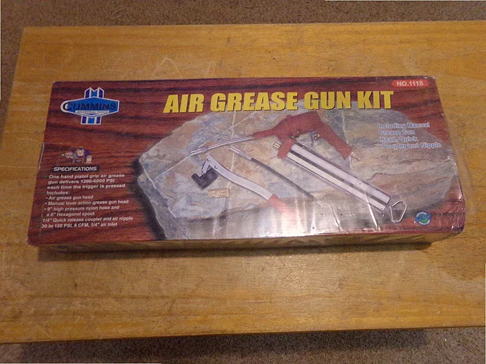 CUMMINS AIR POWERED GREASE GUN. OPEN BOX.